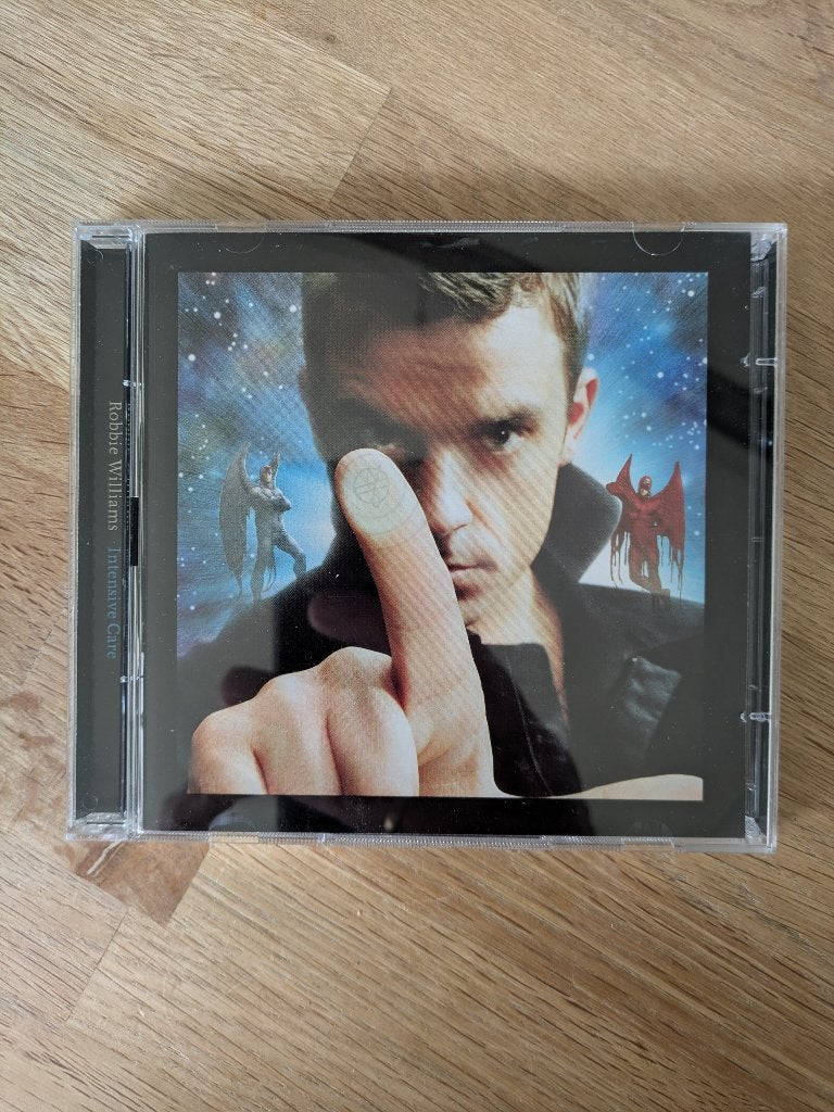 Robbie Williams Intensive Care *special edition*, Pop, Ophalen of Verzenden, Zo goed als nieuw, Inclusief DVD