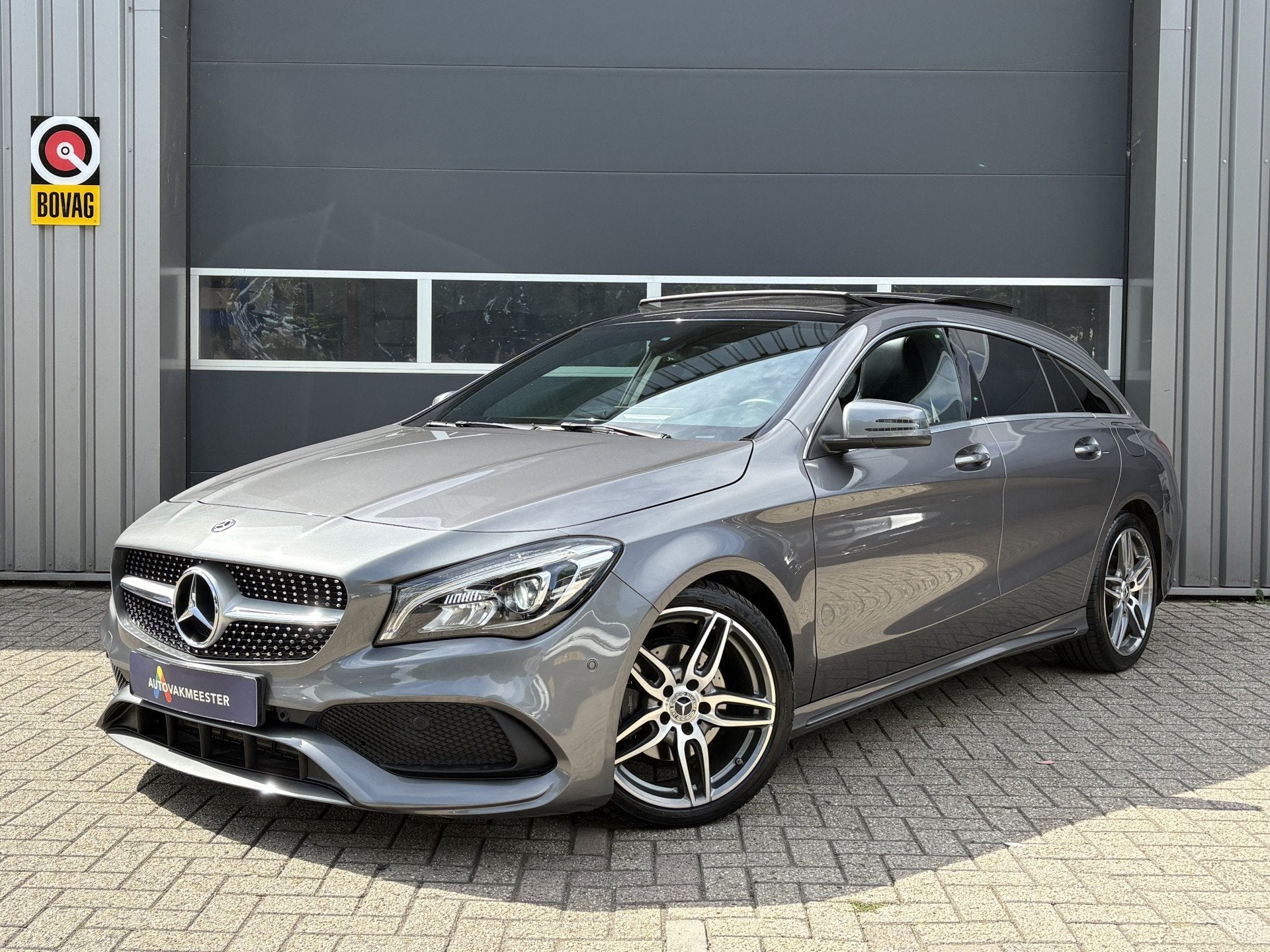 Mercedes-Benz CLA-Klasse Shooting Brake 180 AMG Line Automaa, Gebruikt, Zwart, 4 cilinders, 122 pk