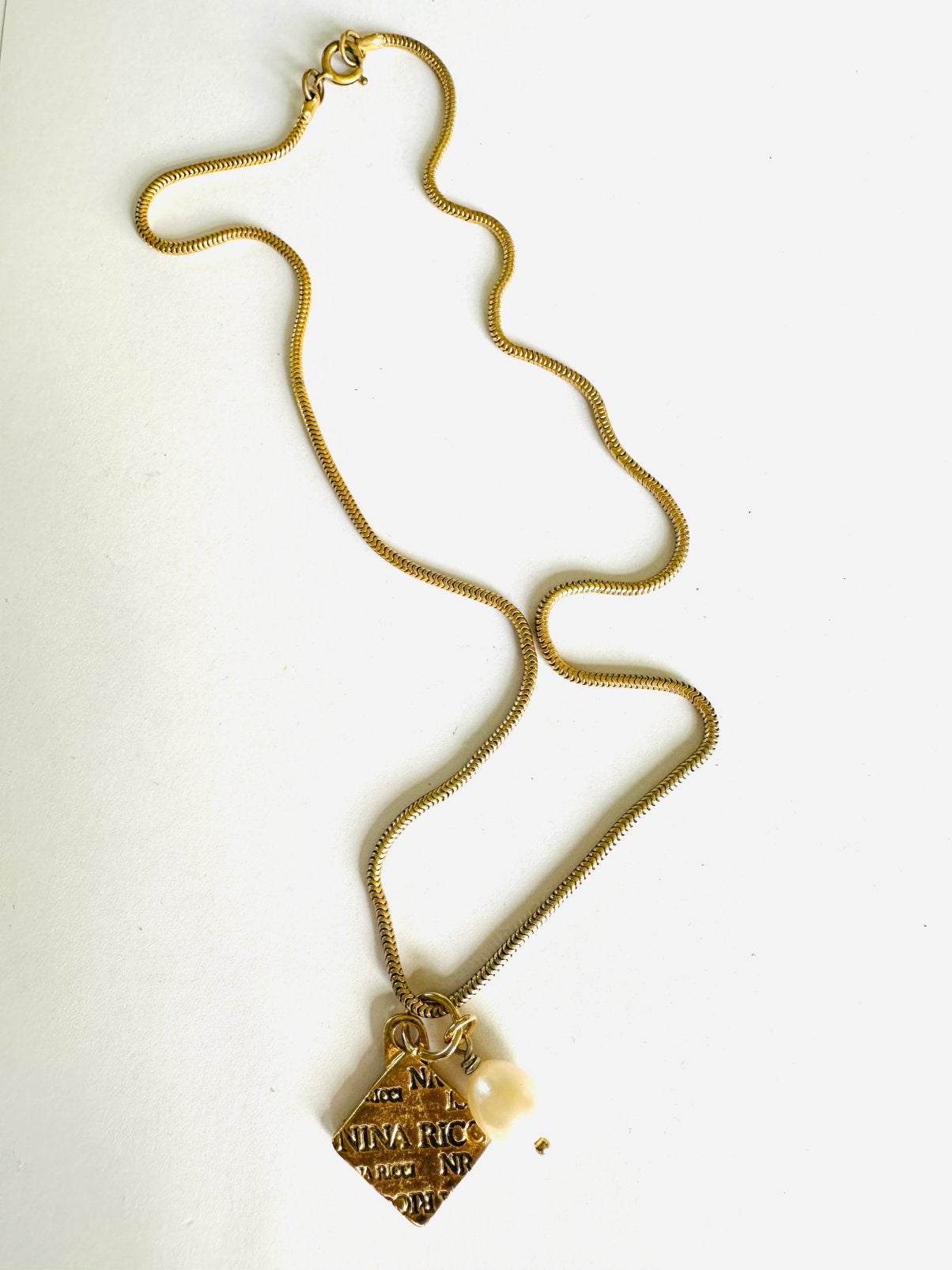 Nina Ricci slangen ketting en hangers, Gebruikt, Verzenden, Goud, Overige materialen