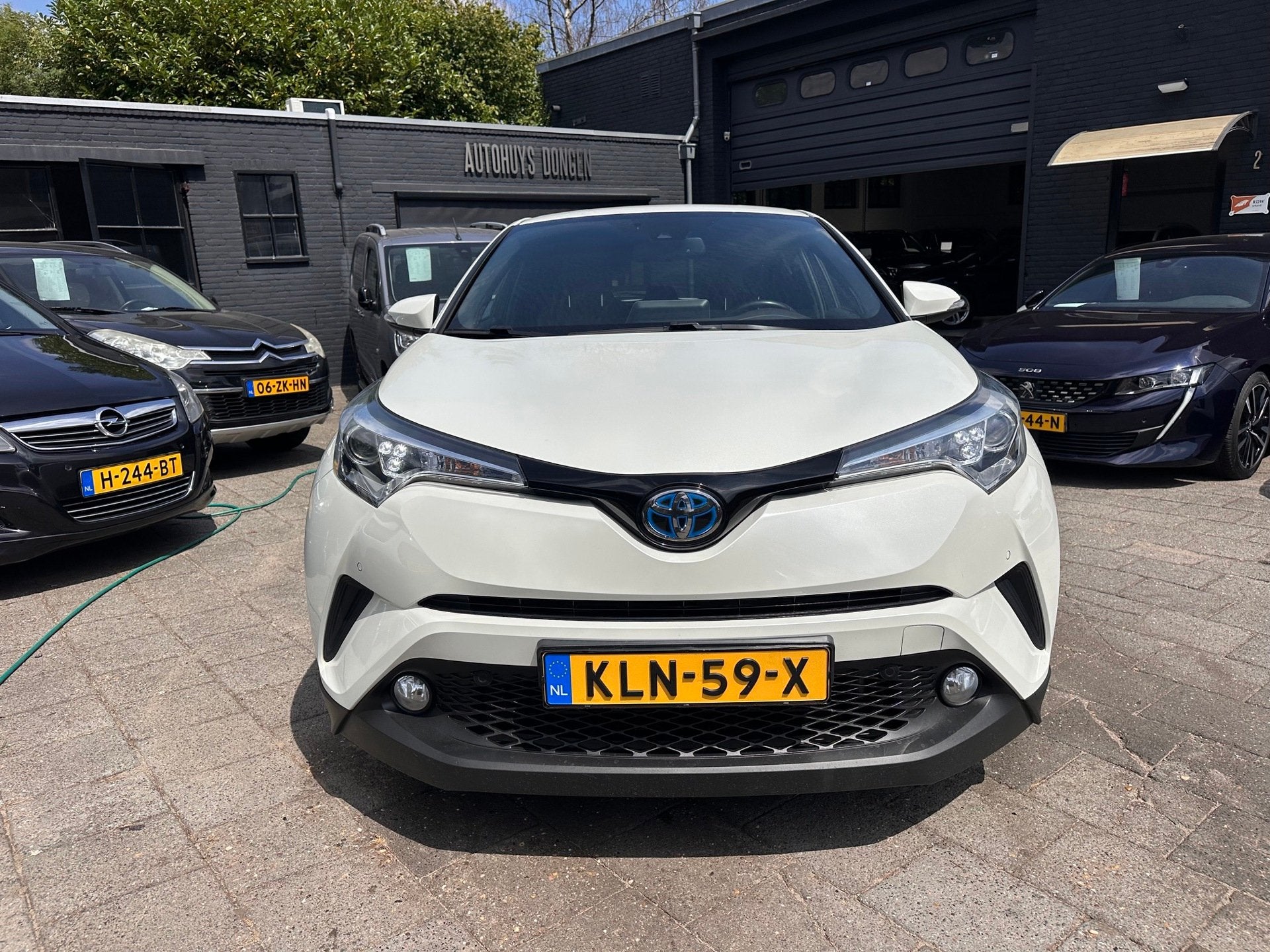 Toyota C-HR 1.8 Hybrid Black Edition|Leder|Navi, Auto's, Dealer onderhouden, Gebruikt, Zwart, 4 cilinders
