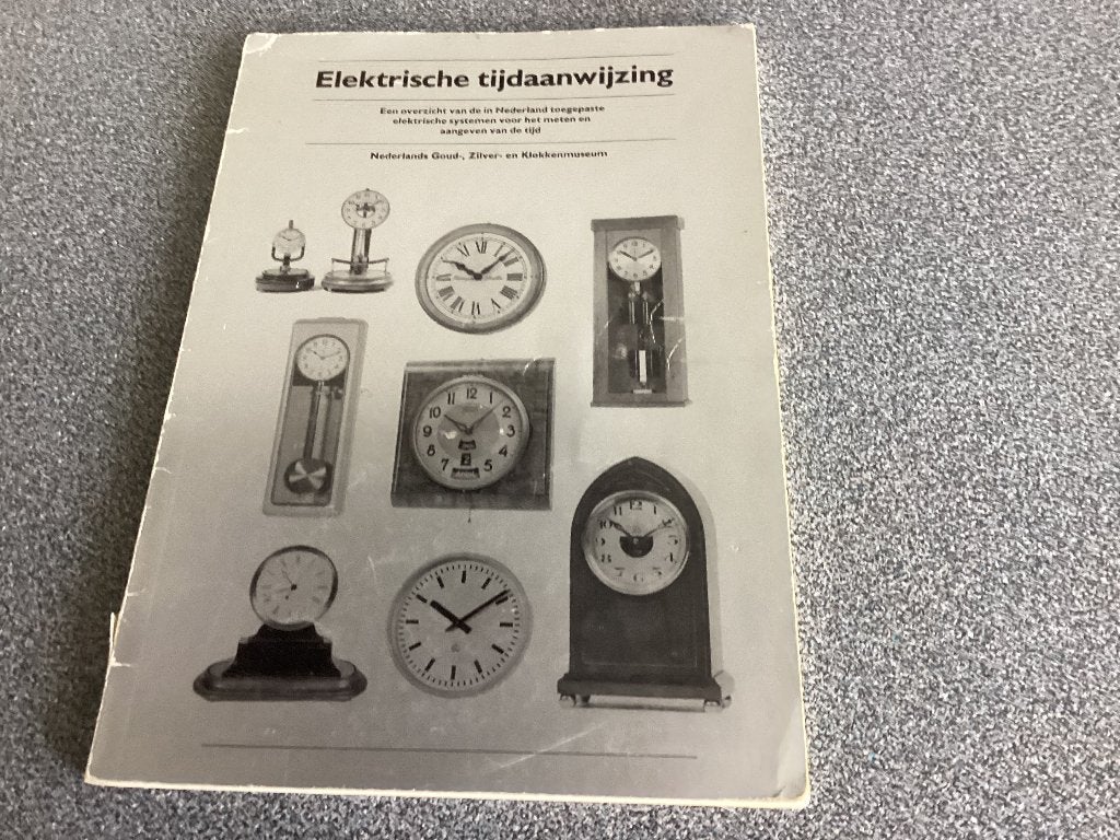 Boek : Elektrische Tijdaanwijzing, Antiek en Kunst, Antiek | Klokken, Ophalen of Verzenden