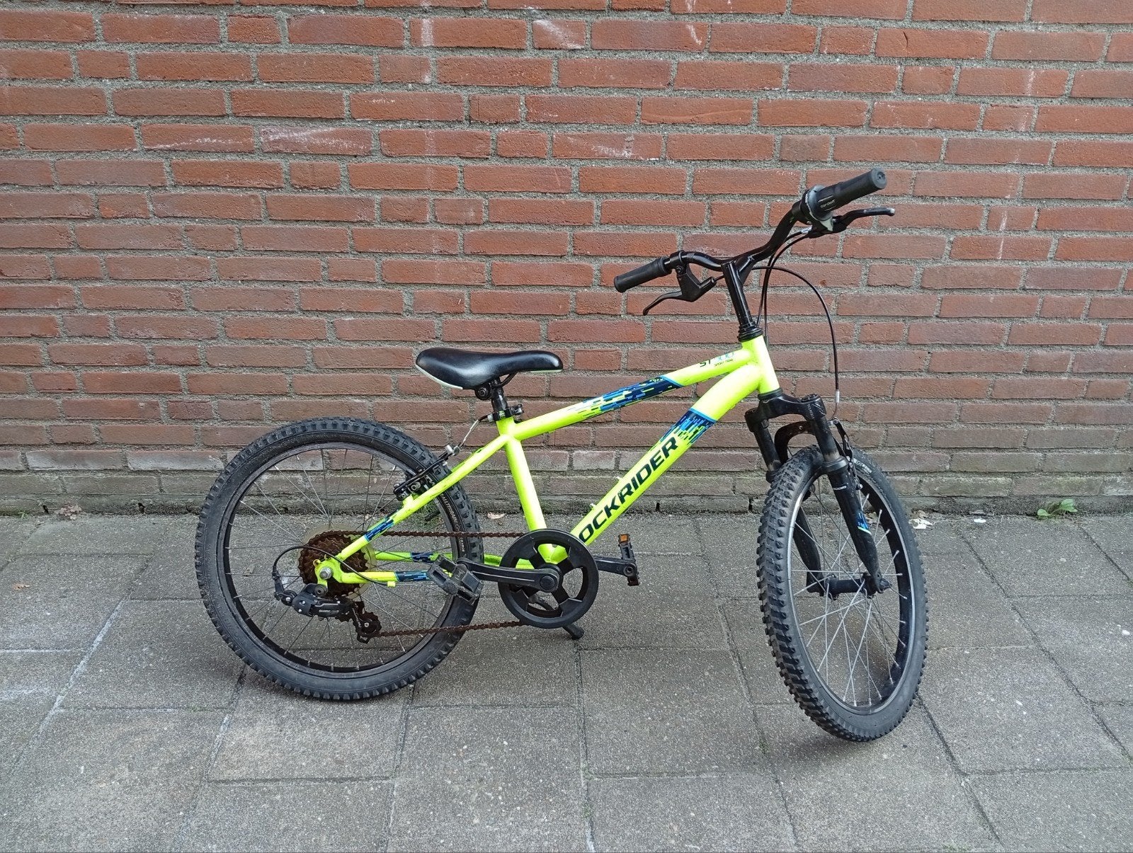 Rockrider ST 100 Kinderfiets 20 inch - Zo goed als nieuw, Ophalen, 20 inch of meer, Velgrem, Zo goed als nieuw