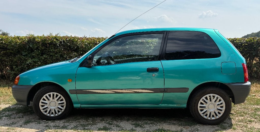 Toyota Starlet 1.3 16V AUT 1996 Groen, Auto's, Automaat, 4 cilinders, Starlet, 400 kg