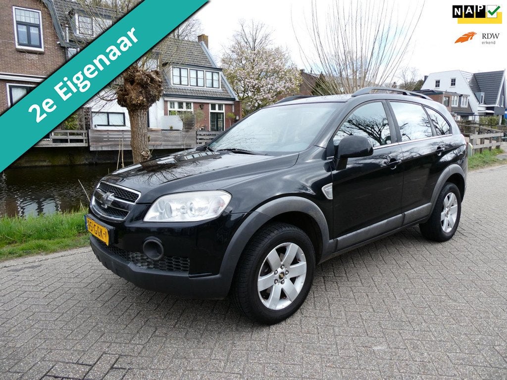Chevrolet Captiva 2.4i Style 2WD 7-Persoons EXPORT ONLY TRAI, Auto's, Chevrolet, Gebruikt, 4 cilinders, 7 stoelen, Zwart