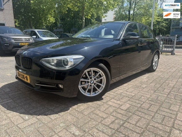 BMW 1-serie 114i EDE Upgrade Edition Navi/Leer, 1-Serie, Euro 5, Achterwielaandrijving, Gebruikt