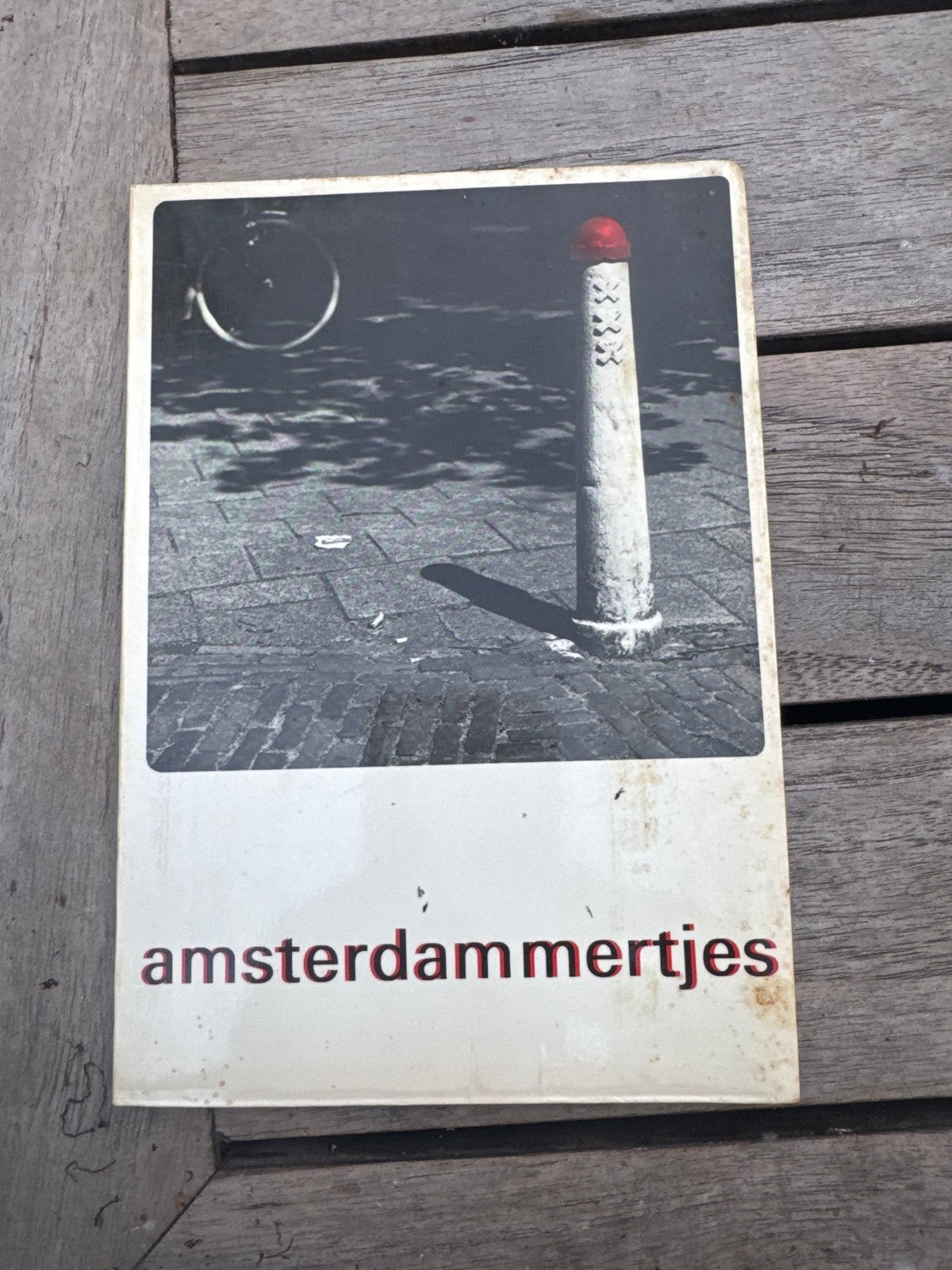 Amsterdammertjes - Boek over Amsterdamse paaltjes, Ophalen of Verzenden, Zo goed als nieuw, Nederland
