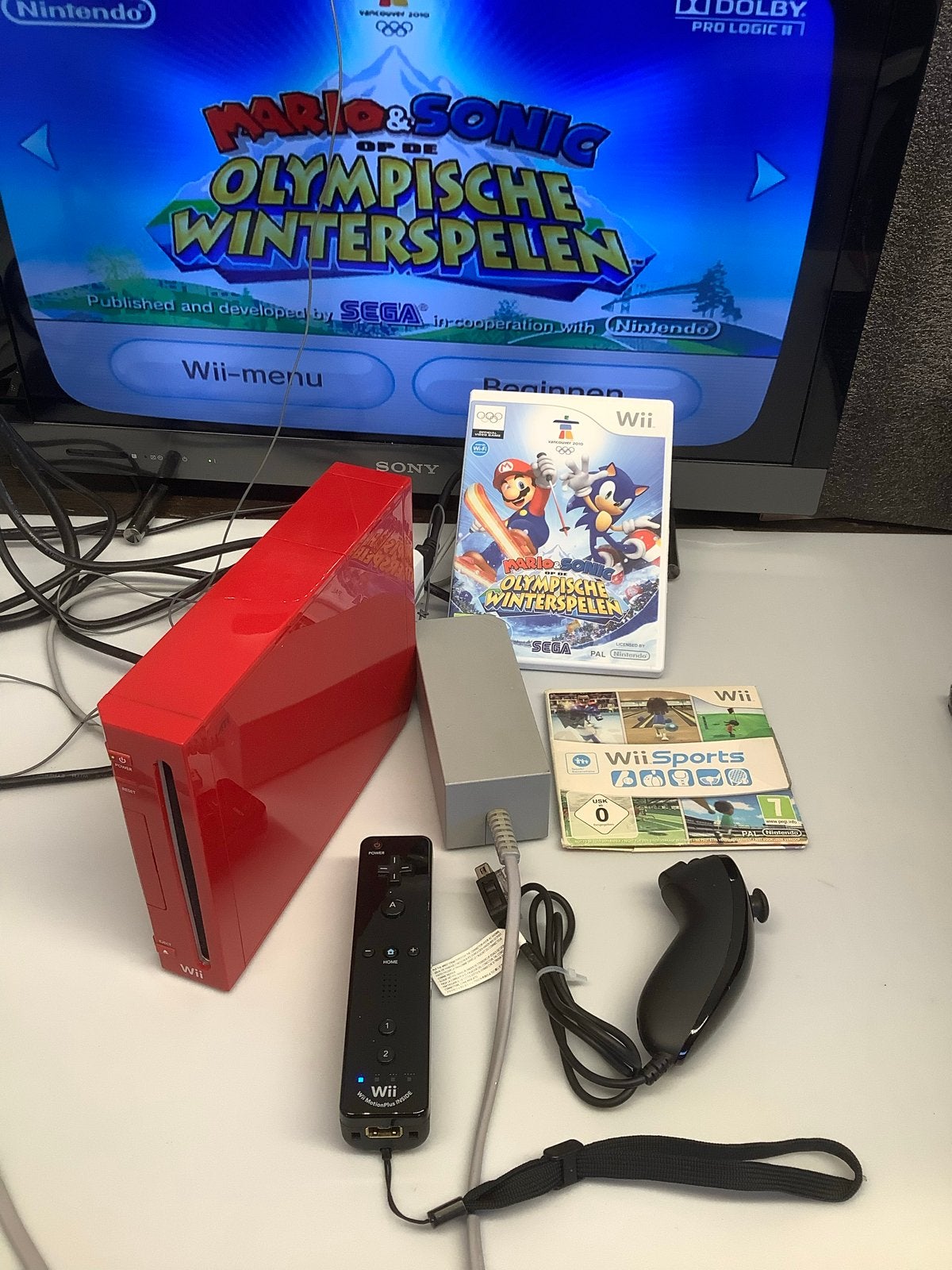 Complete set Nintendo Wii, rood met spellen en 1 controller, Ophalen of Verzenden, Gebruikt, Met 1 controller, Met games