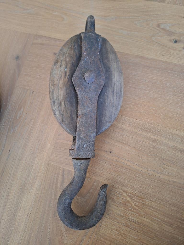 Houten katrol, Ophalen