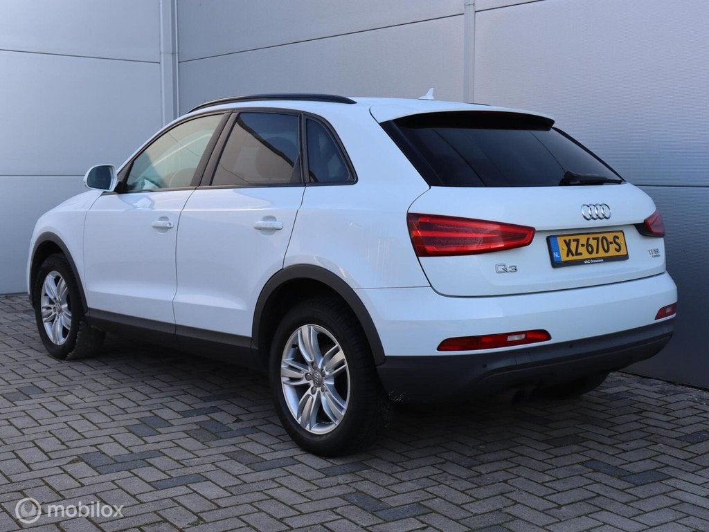 Audi Q3 2.0 TFSI quattro Clima Cruise Xenon PDC LED Navi, Auto's, Euro 5, 4 cilinders, 1984 cc, Wit