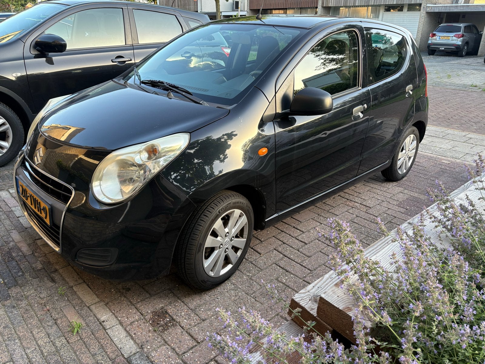 Suzuki Alto 1.0 cool comfort 2012 Zwart, Voorwielaandrijving, Elektrische ramen, 200 kg, 4 stoelen
