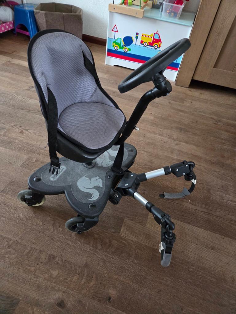 Meerijdstoel voor de kinderwagen, Ophalen