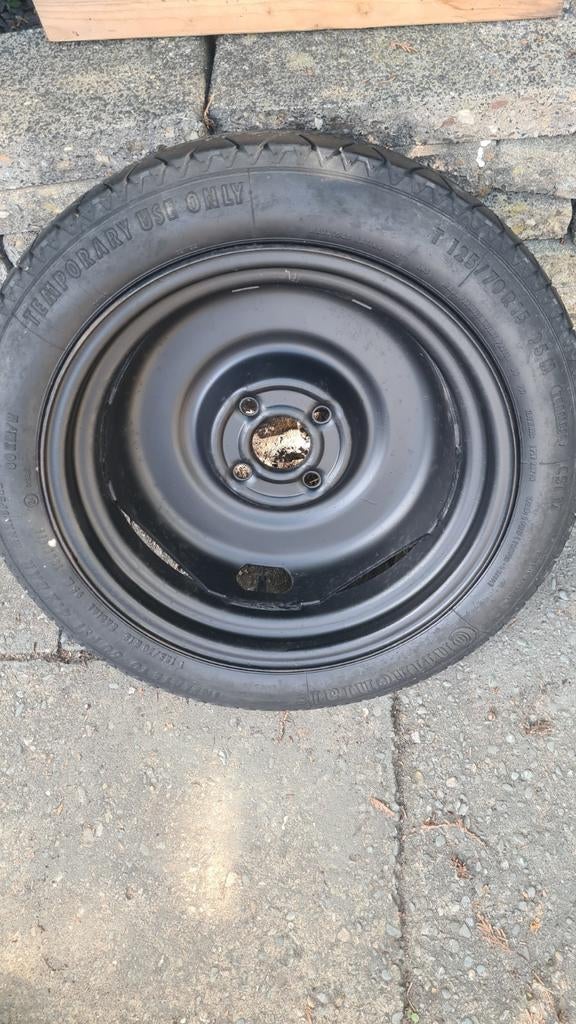Reserve wiel thuiskomer 4x100 15 inch T 125 70 R15 as57mm, Ophalen