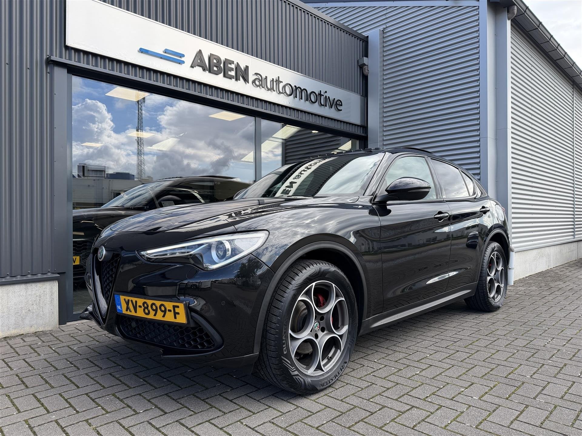 Alfa Romeo Stelvio 2.0T 280PK AWD Super (PANO|LEDER|4-SEIZ|M, 2000 kg, Zwart, Leder, Bedrijf