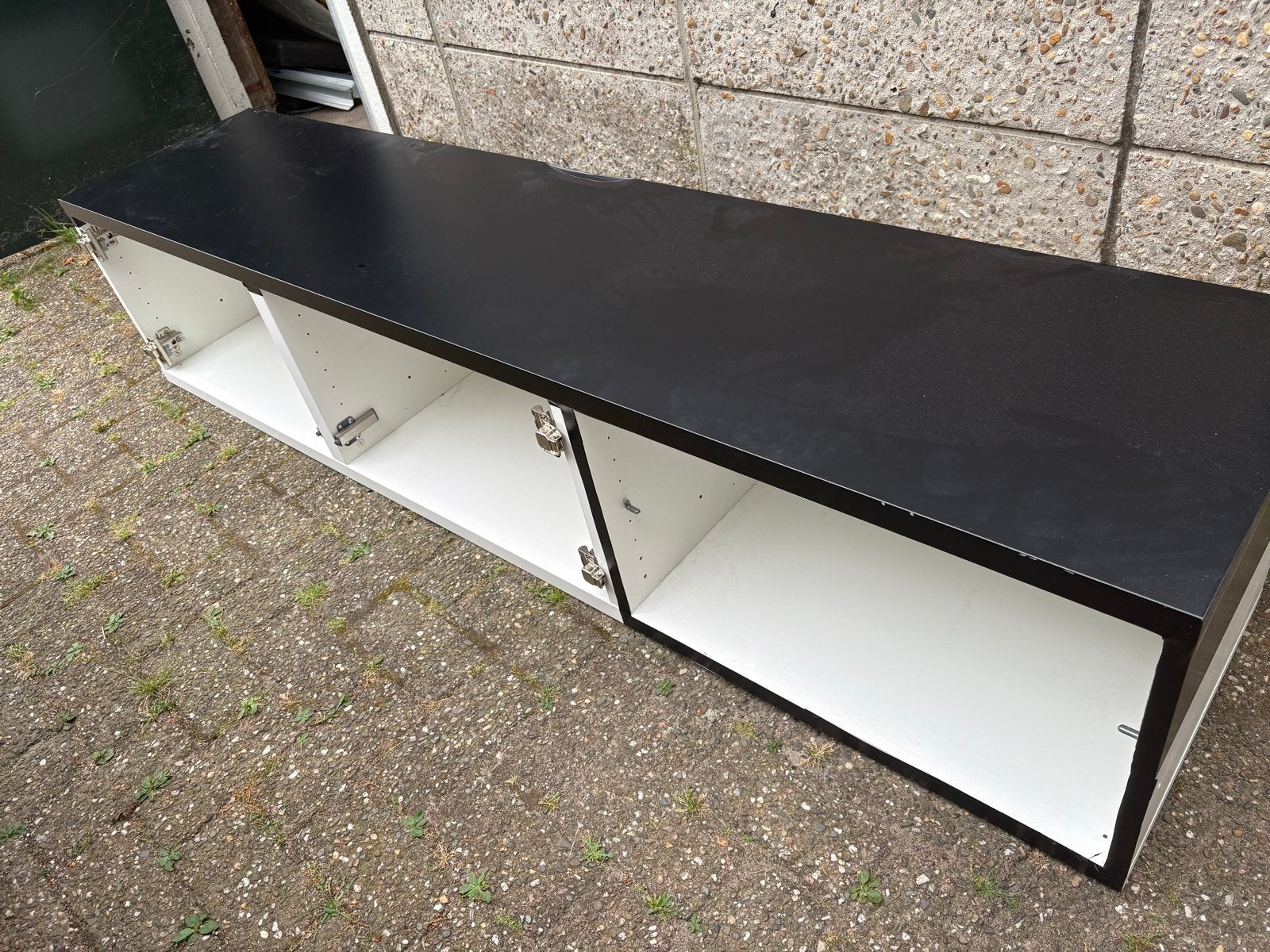 Ikea Besta TV meubel 180 cm wit met zwarte folie en deurtjes, Ophalen, Gebruikt, Kunststof, 150 tot 200 cm