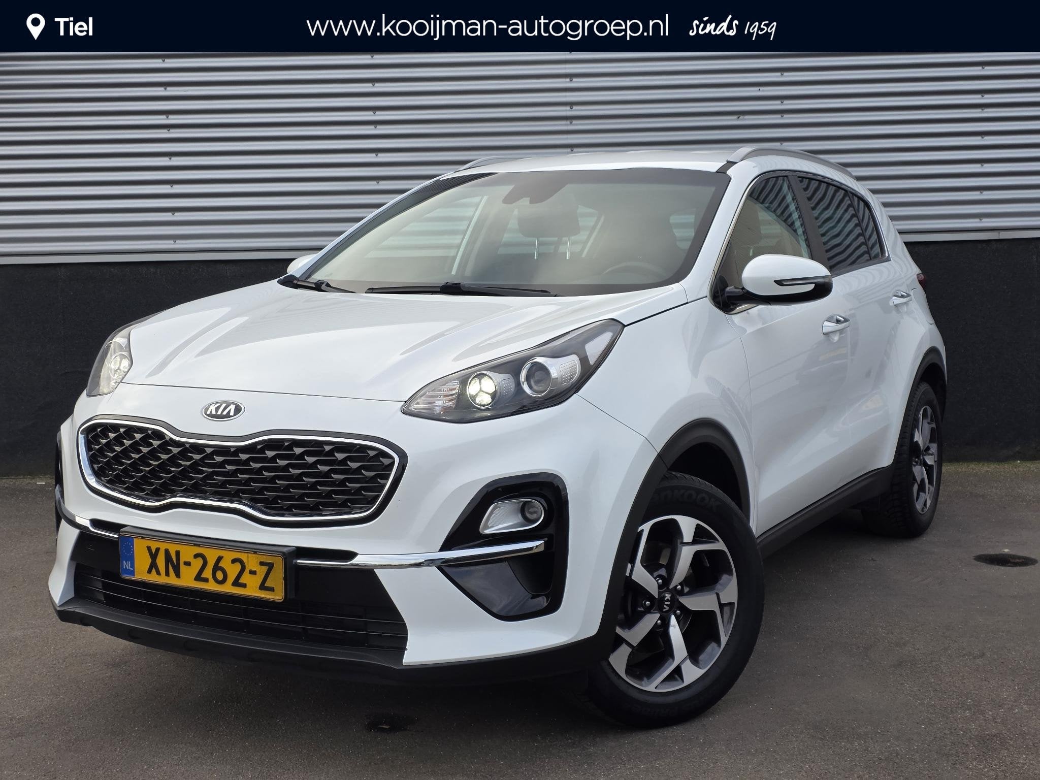 Kia Sportage 1.6 GDI DynamicLine Trekhaak, Nieuw geleverd en, Auto's, Kia, Stof, Gebruikt, 4 cilinders, 1390 kg