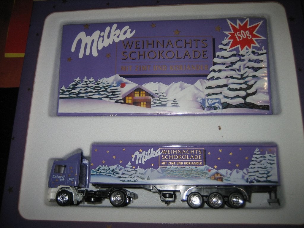Milka Kerst  Choco  VOLVO F-12  met oplegger  Herpa/Albedo, Ophalen of Verzenden, Zo goed als nieuw, Bus of Vrachtwagen, Herpa