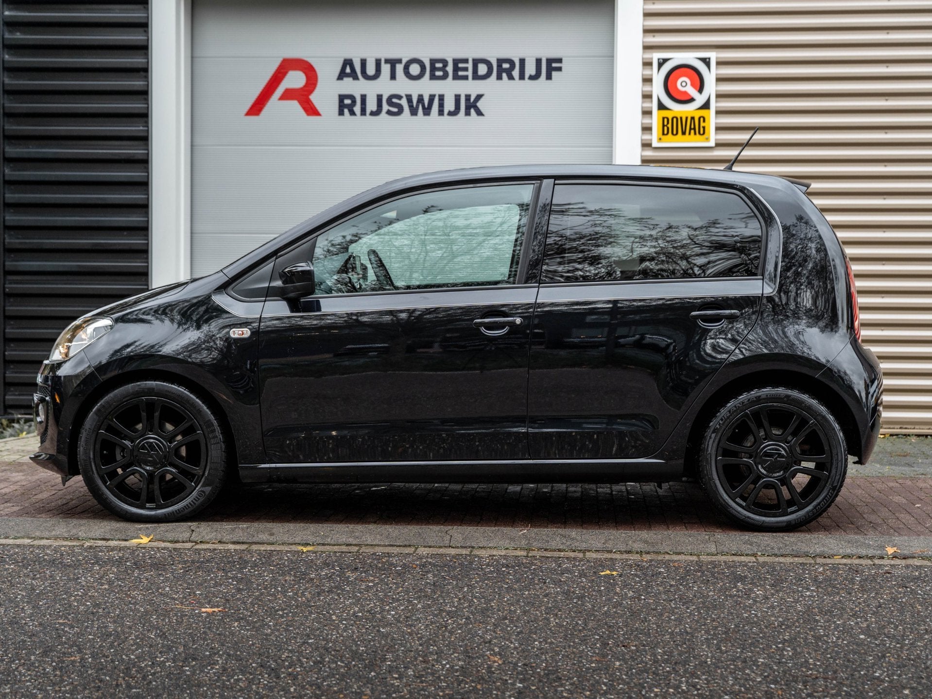 Volkswagen Up! 1.0 high up! BlueMotion Navi/Pdc, Auto's, Voorwielaandrijving, Gebruikt, 840 kg, Zwart