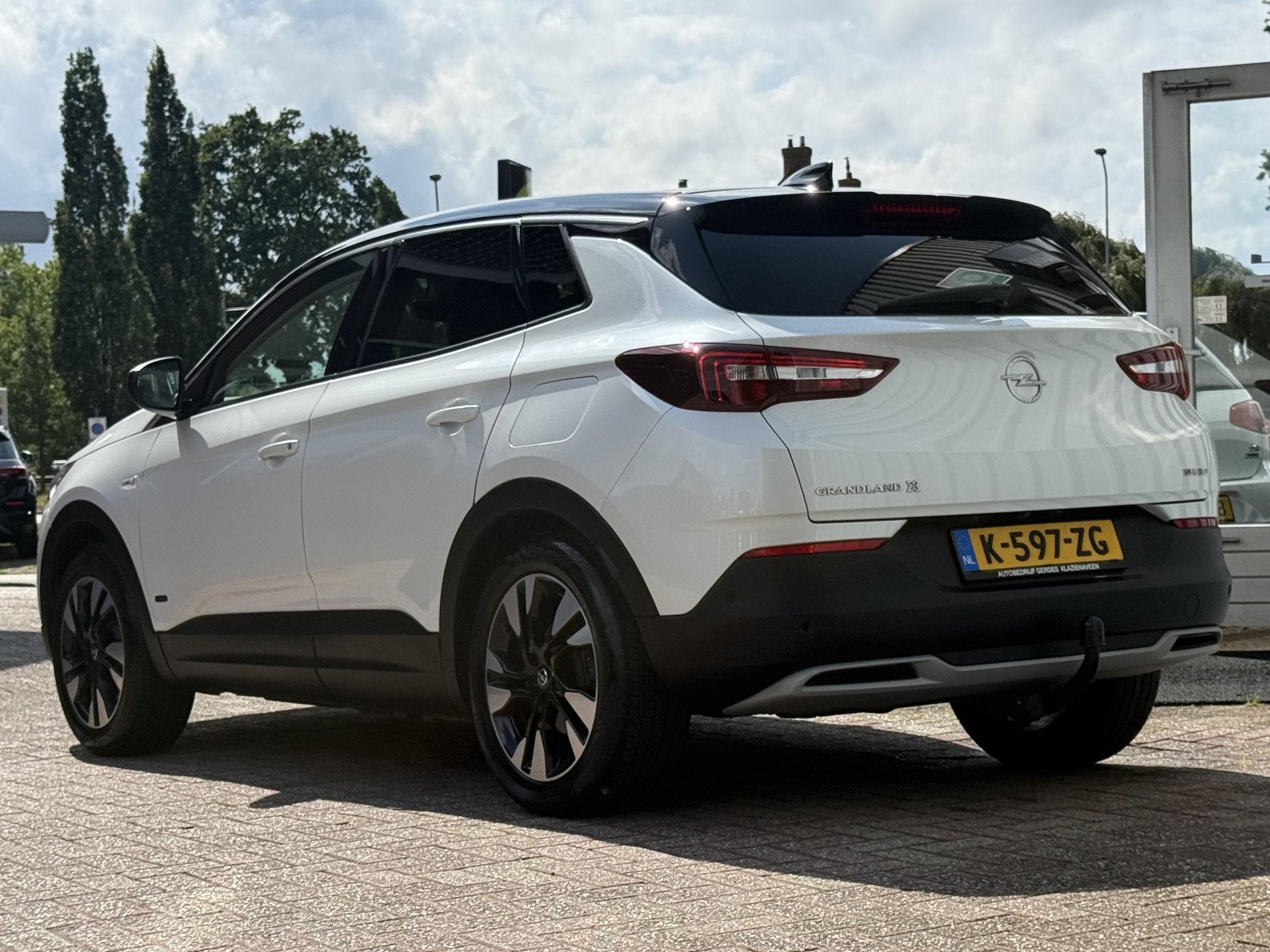 Opel Grandland X 1.6 Turbo Hybrid Business Elegance 181pk |, Auto's, Dealer onderhouden, 4 cilinders, Leder en Stof, Wit