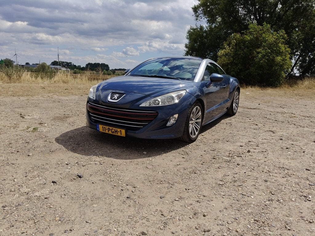 Peugeot RCZ 1.6 THP 2011 Blauw, Auto's, Peugeot, Voorwielaandrijving, 15 km/l, Zwart, Leder en Stof