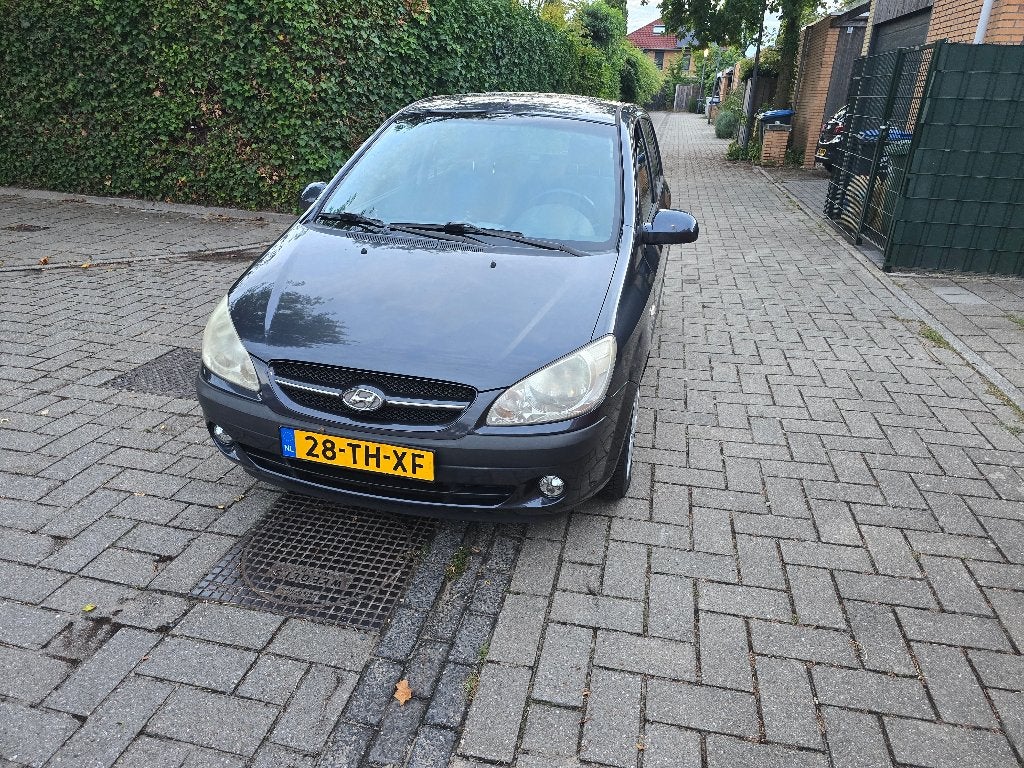 Hyundai Getz 1.4 2006 Apk 9/12/2026/  Nissan Micra 1.3 2001, Auto's, Bedrijf, Te koop, Metallic lak