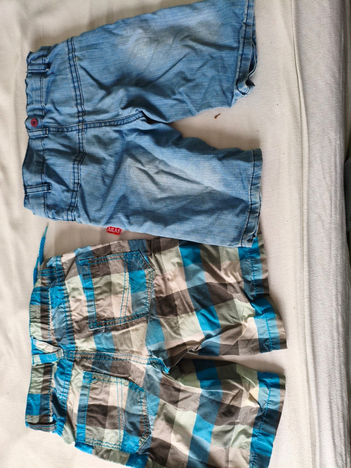 Jongens kledingpakket maat 98: zwembroek en korte broek, Ophalen