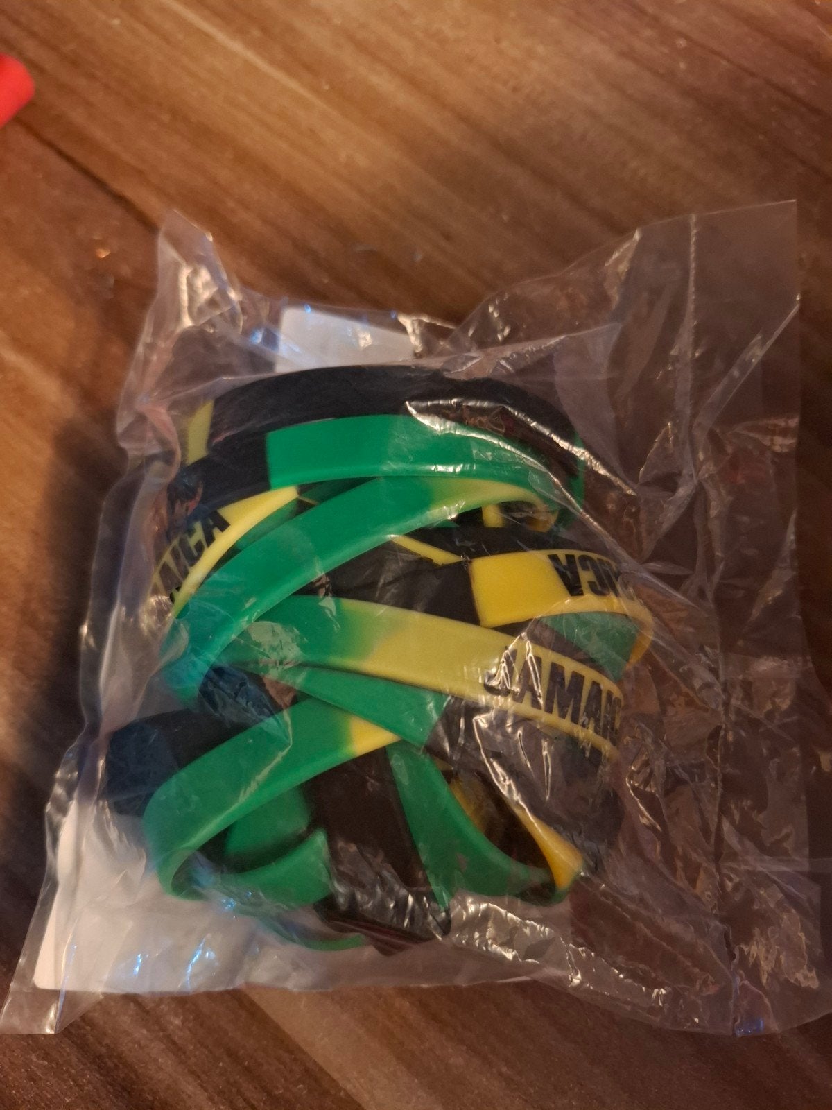Jamaica Elastiek Armbanden - Set van 24 stuks, Ophalen of Verzenden, Nieuw, Overige kleuren, Elastiek