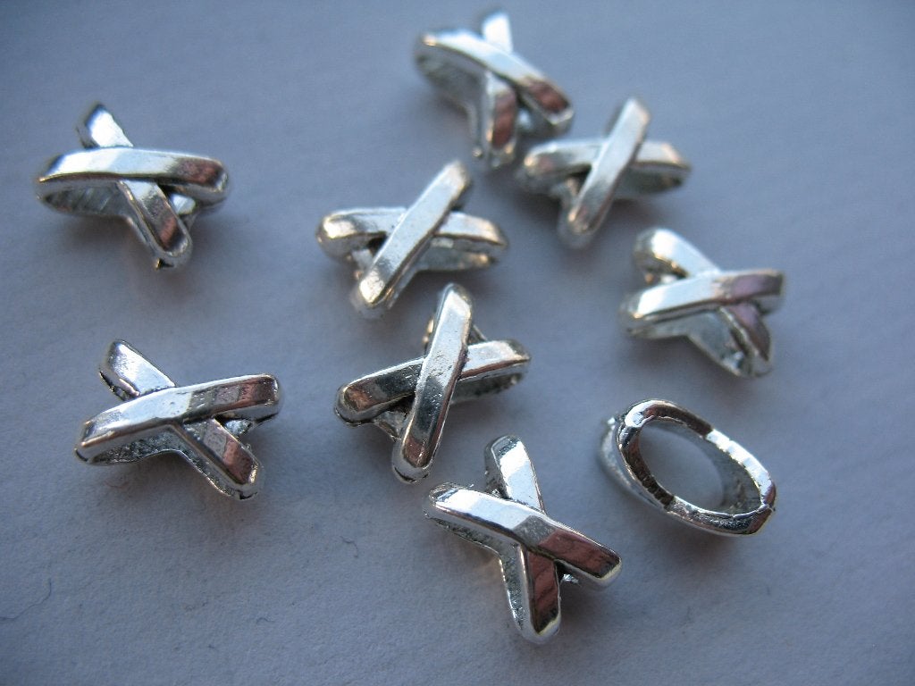7024/  AANBIEDING verzilverde metalen leerschuivers, Ophalen of Verzenden, Nieuw, Kraal