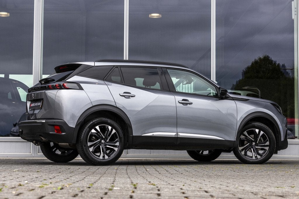 Peugeot 2008 1.2 PureTech Allure Pack | Camera | Trekhaak |, Auto's, Peugeot, 12 maanden, 101 pk, Gebruikt, Euro 6