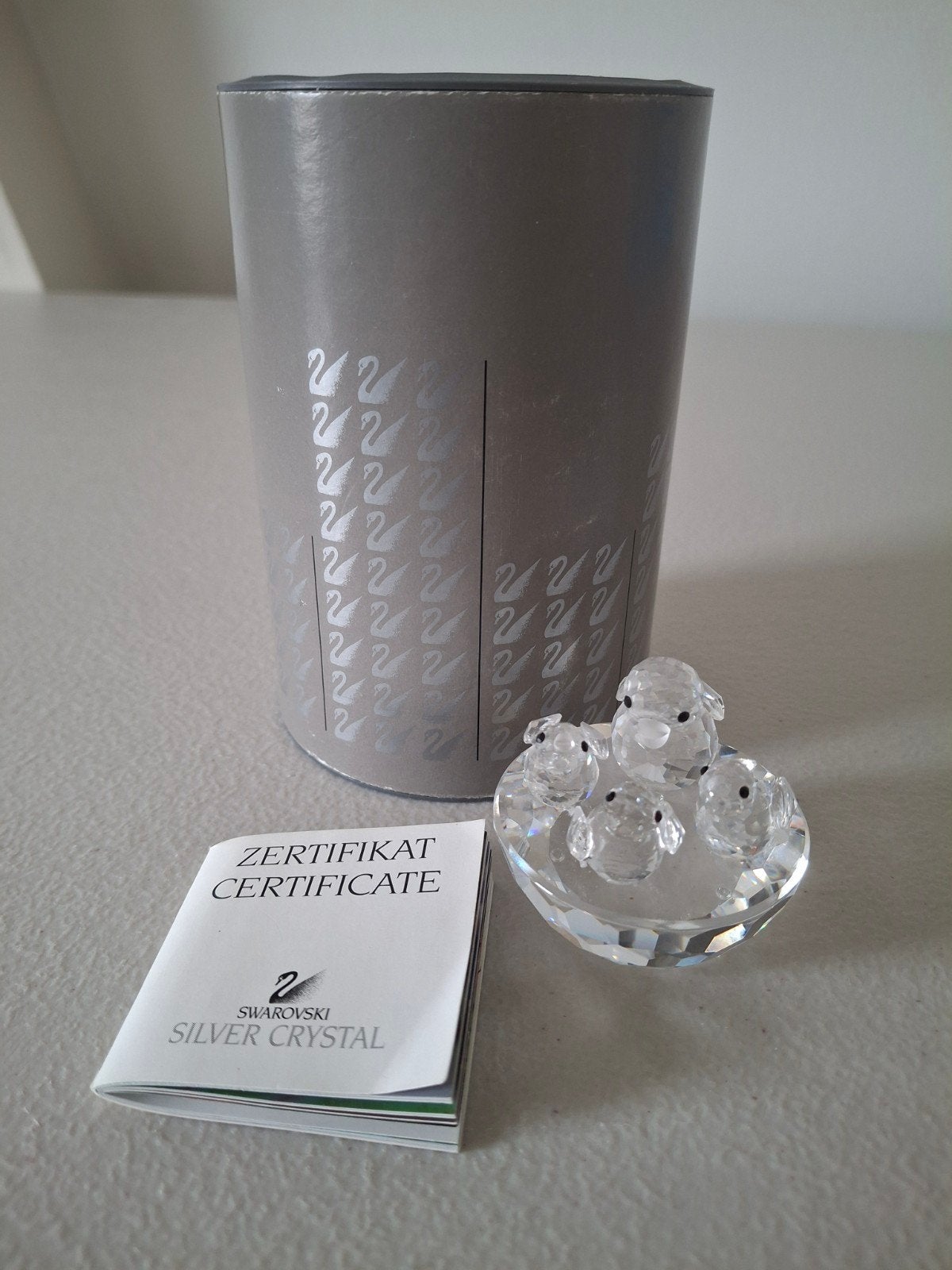 45. Swarovski vogelnest in doos met certificaat, Ophalen of Verzenden, Nieuw, Figuurtje