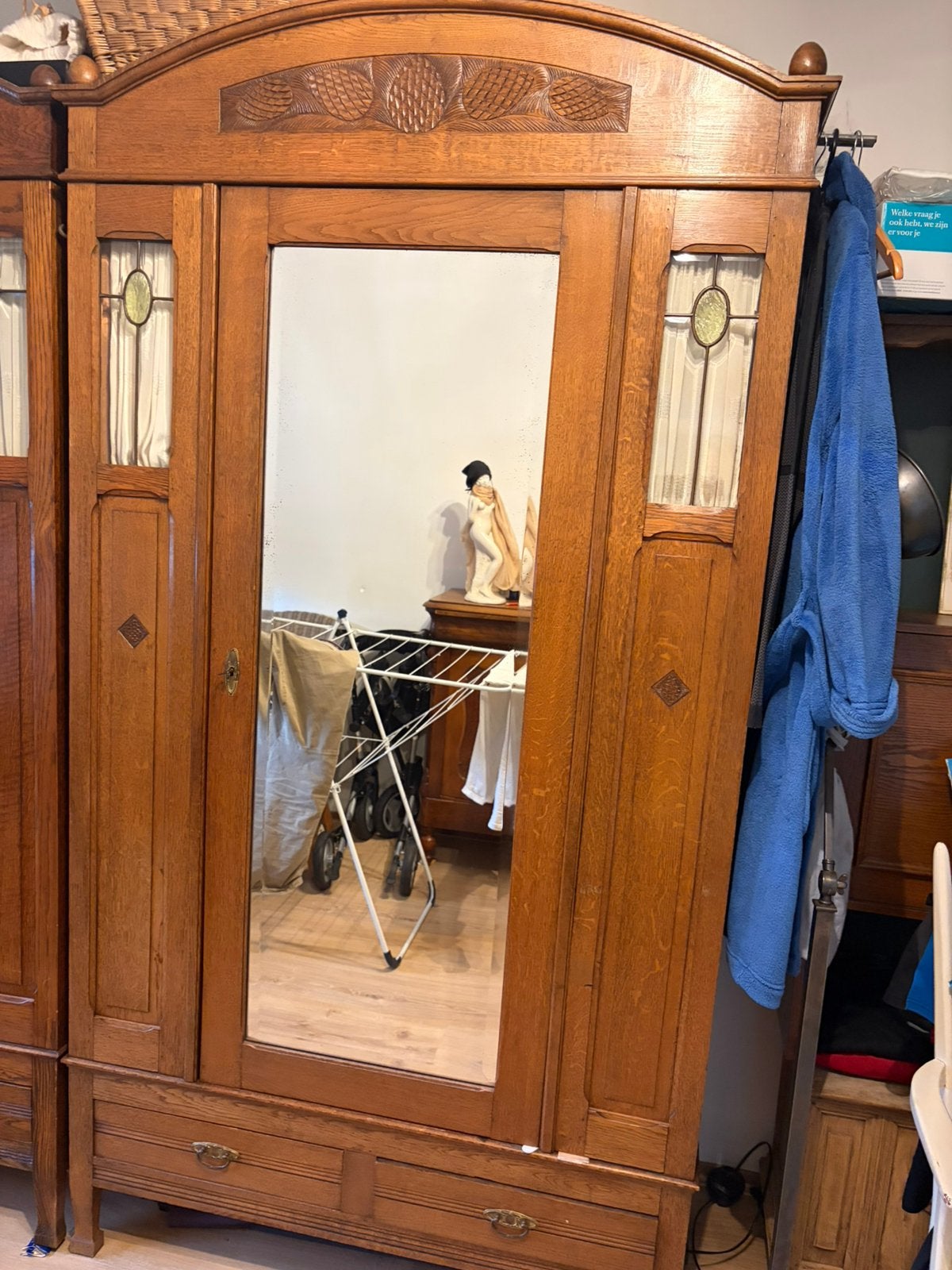 Antieke Amsterdamse school kast, Ophalen