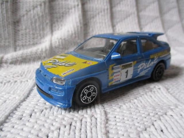 bburago ford escort cosworth 1/43, Hobby en Vrije tijd, Ophalen of Verzenden, Gebruikt, Auto, Overige merken
