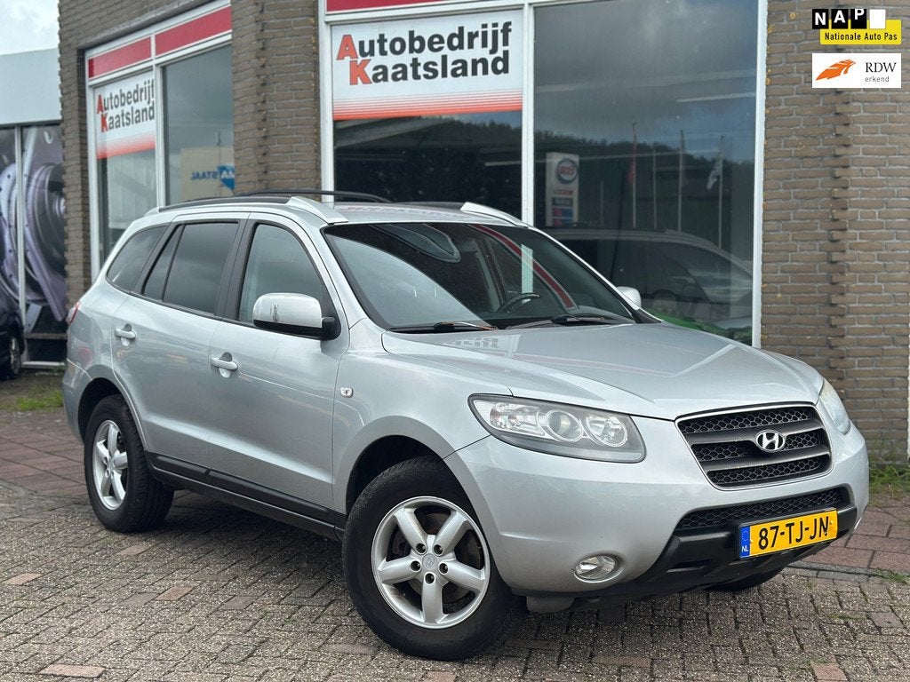 Hyundai Santa Fe 2.7i V6 Dynamic - Clima - Cruise - Trekhaak, Auto's, Hyundai, Voorwielaandrijving, Gebruikt, Zwart, 2000 kg