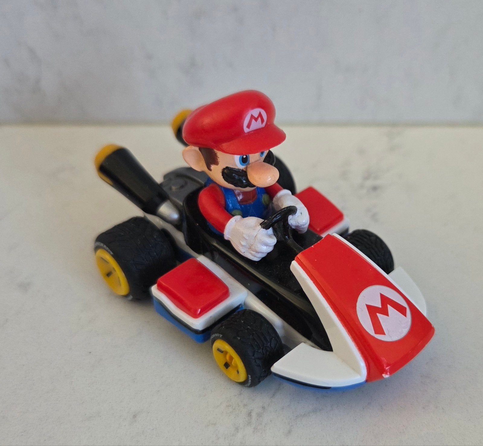 Mario Kart speelgoedauto met Mario figuur, Ophalen of Verzenden, Gebruikt