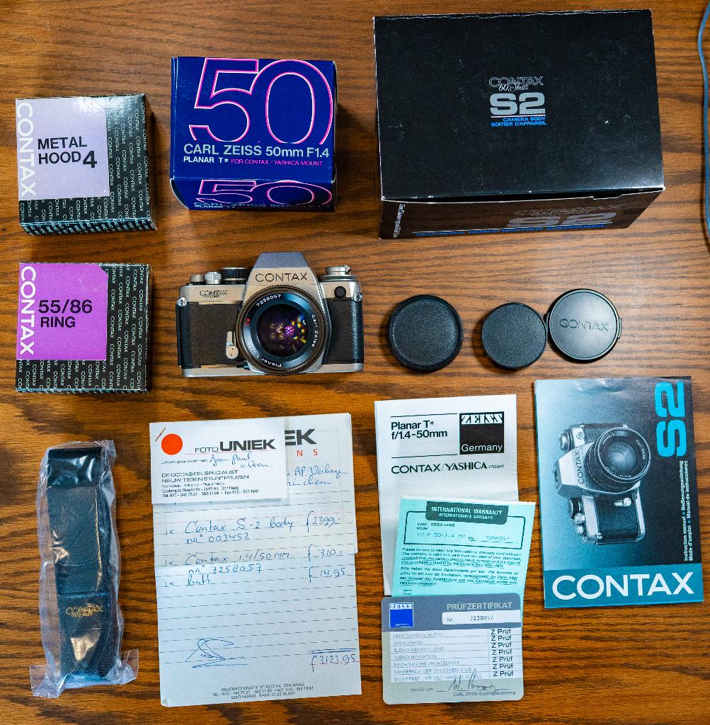 NIEUW IN DOOS: Contax S2 - Carl Zeiss 50mm F 1.4 MMJ MINT, Audio, Tv en Foto, Fotocamera's Analoog, Verzenden, Nieuw, Spiegelreflex
