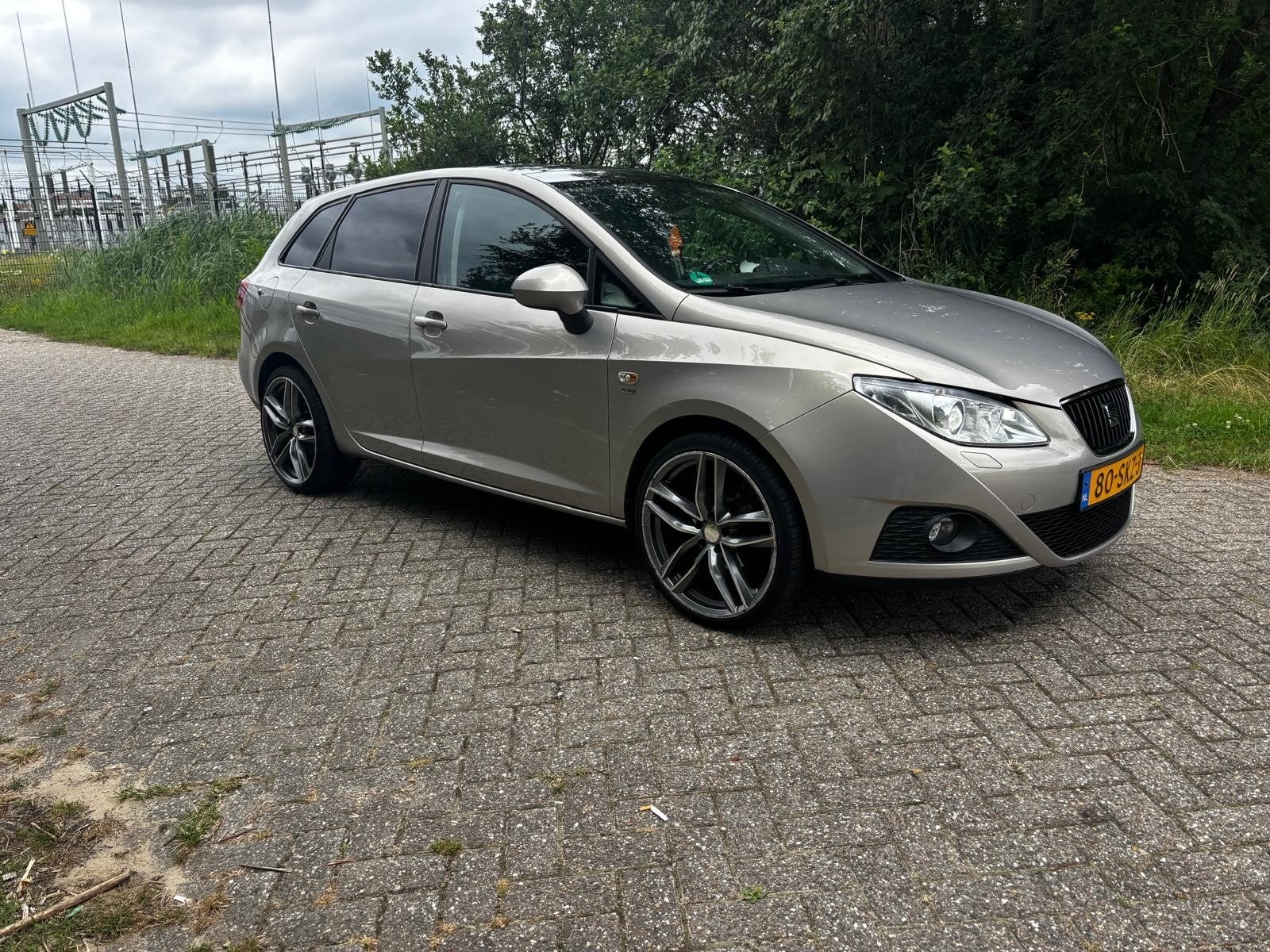 Seat Ibiza ST automaat 5 deurs met trekhaak, Auto's, Seat, Zwart, 19 km/l, Particulier, Lederen bekleding