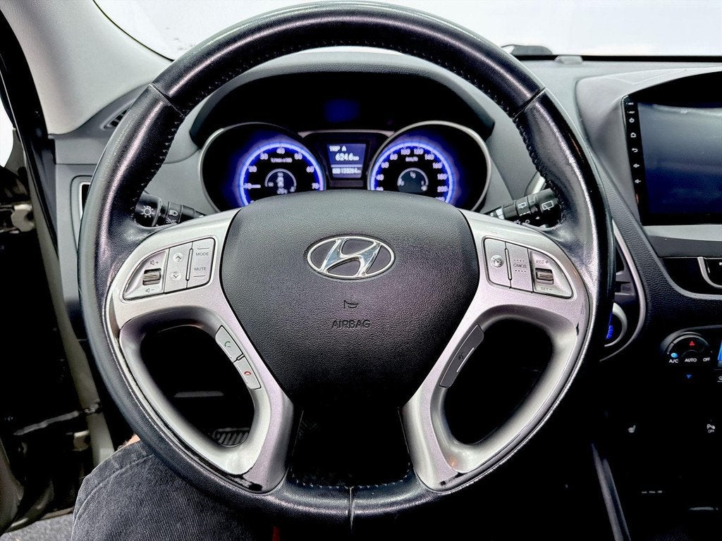 Hyundai ix35 2.0i Business Edition Ruime SUV met sterke moto, Auto's, Gebruikt, Automatische klimaatregeling, 4 cilinders, Met garantie (alle)