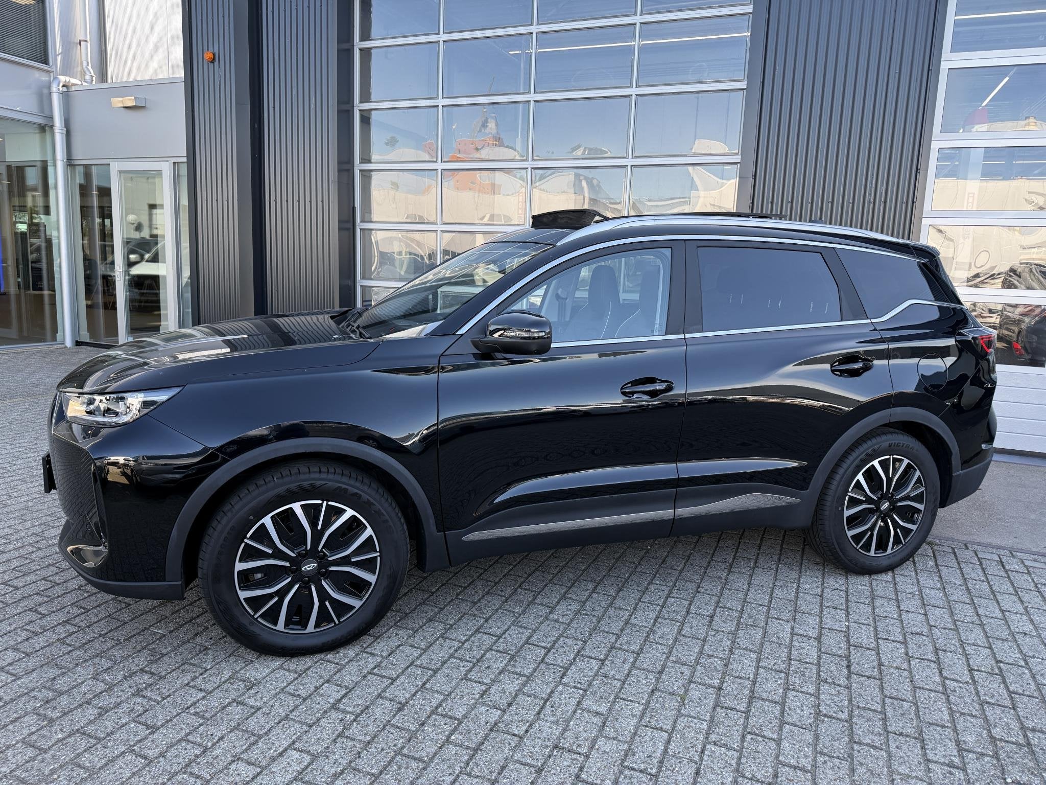 Chery Tiggo 7 Unique PHEV Panoramadak | Stoelverwarming en k, Auto's, Automaat, Stof, Zwart, Bedrijf