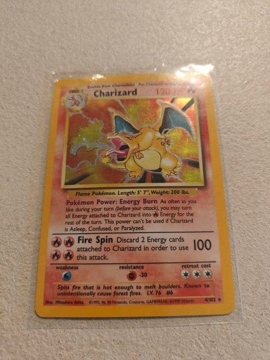 Charizard Pokémon kaart 4/102 Holo Base Set, Hobby en Vrije tijd, Ophalen of Verzenden