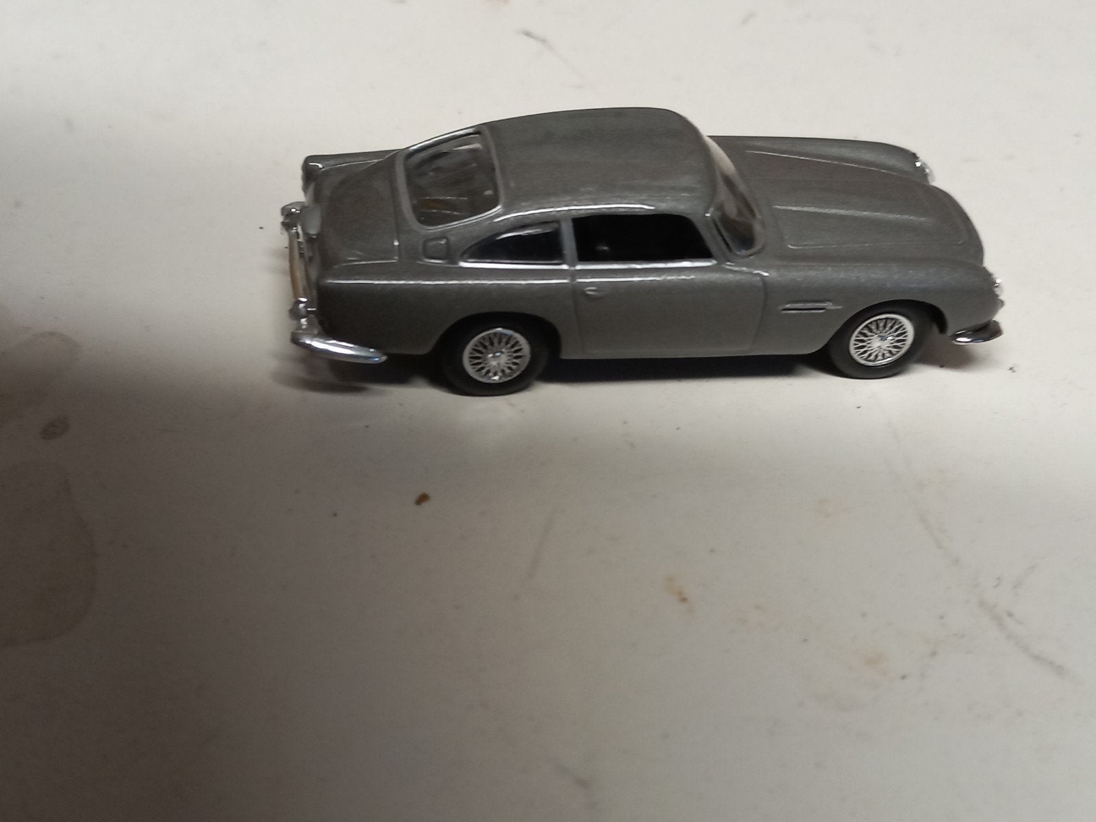 Aston Martin DB5 modelauto - James Bond editie, Ophalen of Verzenden, Zo goed als nieuw, Auto, Schuco