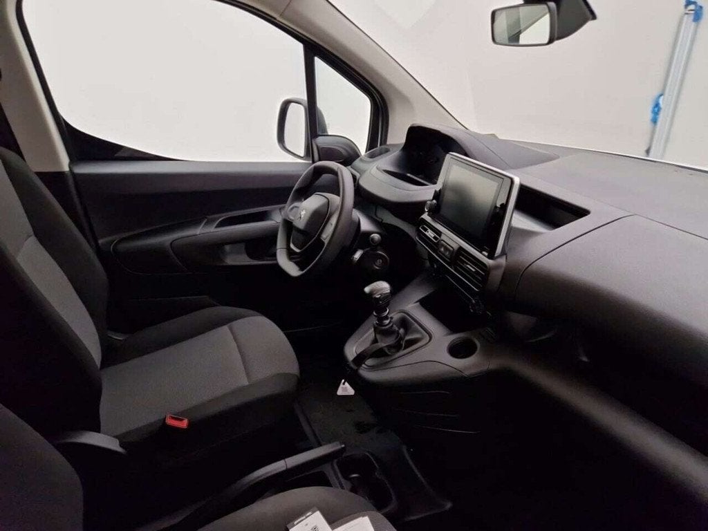 Peugeot Partner 1.2  Benzine Standaard L1 Light PureTech, Auto's, Peugeot, Gebruikt, 581 cc, Wit, Handgeschakeld