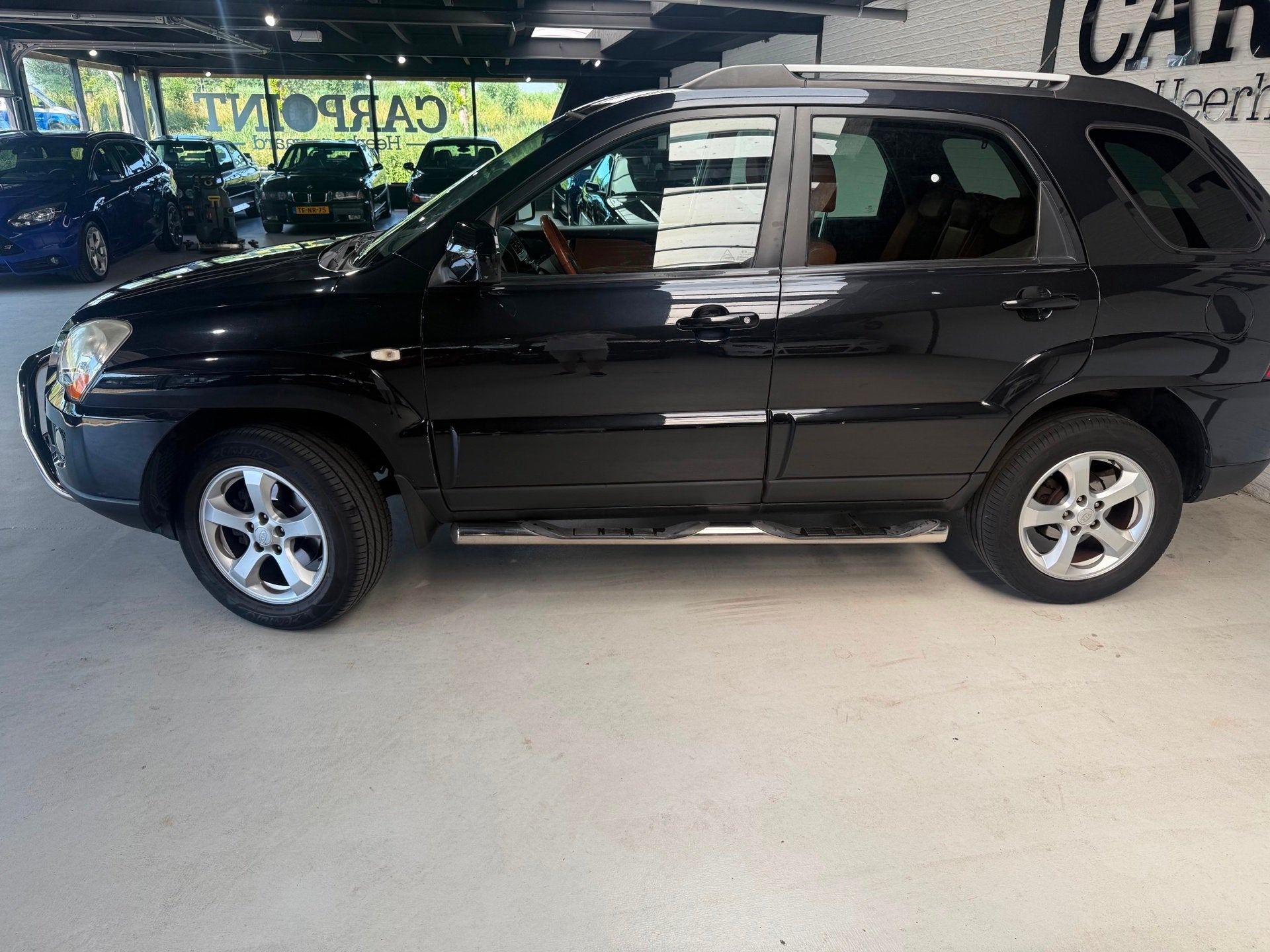 Kia Sportage 2.0 CVVT Fifteen2010 Schuifdak Bullbar Leer Cru, Auto's, 1442 kg, Gebruikt, 4 cilinders, Leder en Stof