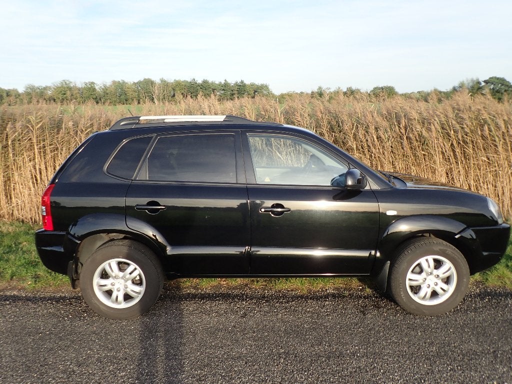 Te koop Hyundai Tucson 2.0i Style 2008 2WD Zwart / Leder, Auto's, Hyundai, Automatische klimaatregeling, Zwart, 4 cilinders, Zwart