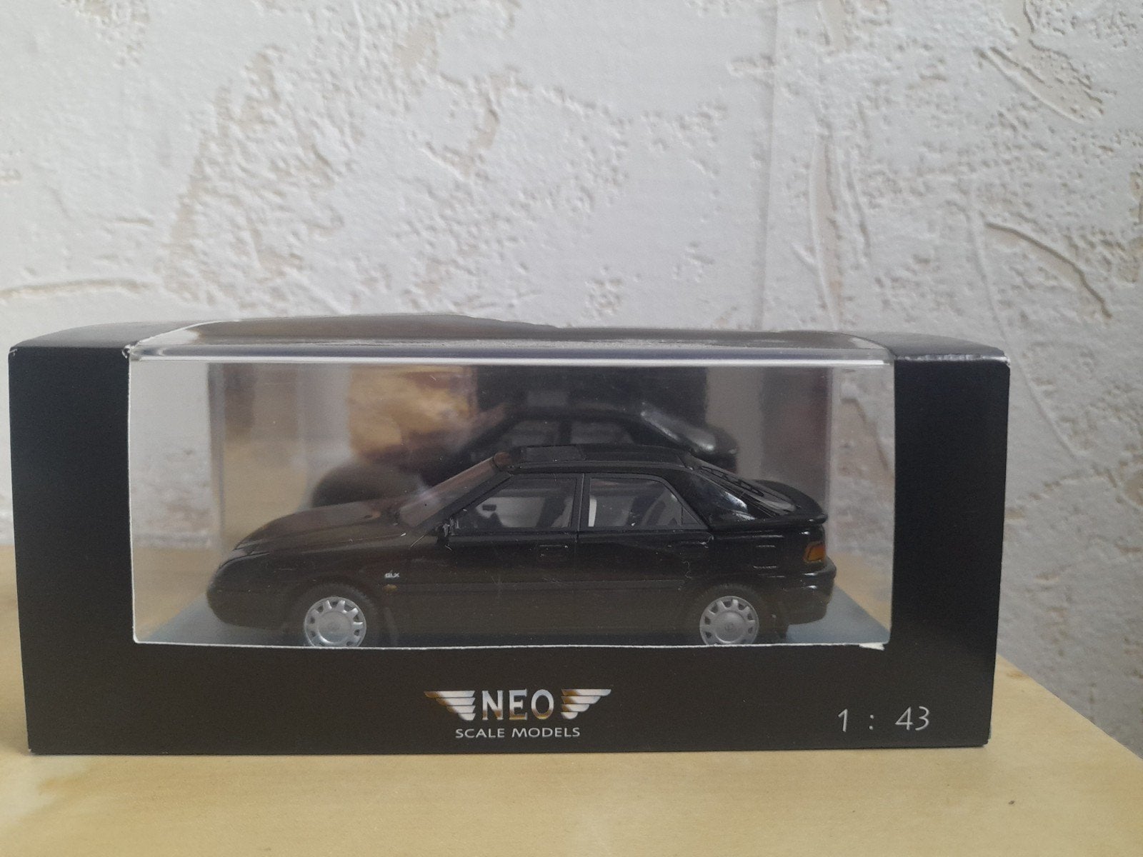 Mazda 323F Zwart 1991 Neo Scale Models 1/43 (Incl Ovp), Hobby en Vrije tijd, Ophalen of Verzenden, Zo goed als nieuw, Auto, Overige merken