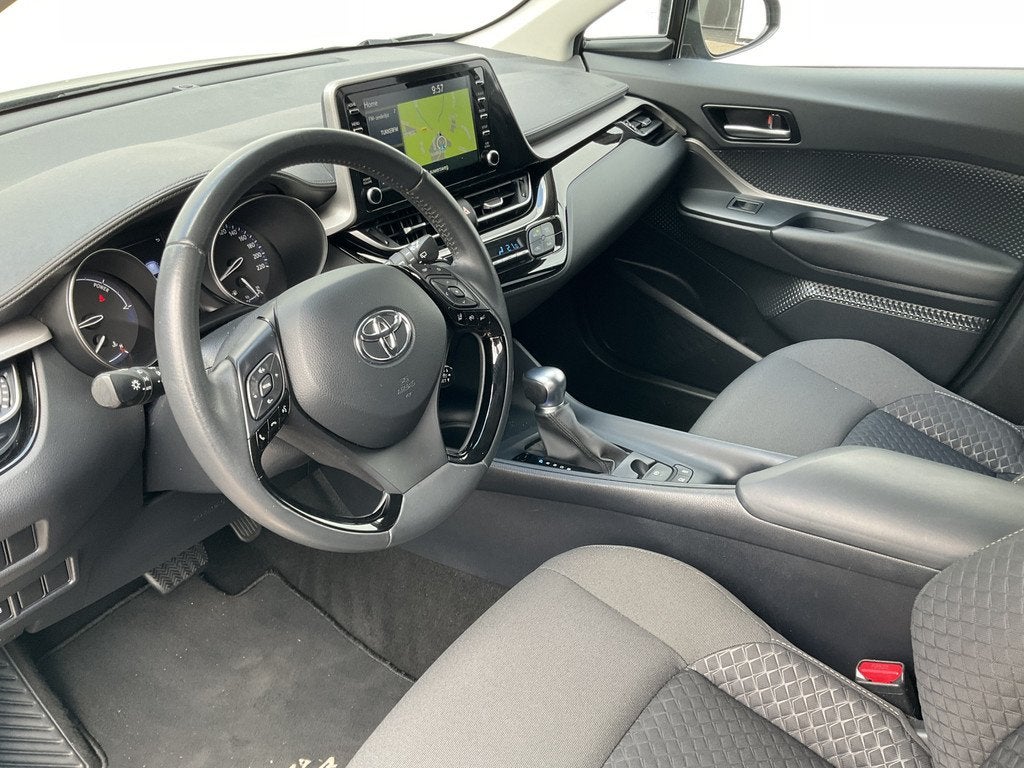 Toyota C-HR 1.8 Hybrid Carplay Camera Adapt.Cruise Hoge Zit, Auto's, Euro 6, 4 cilinders, 171 pk, Hybride Elektrisch/Benzine