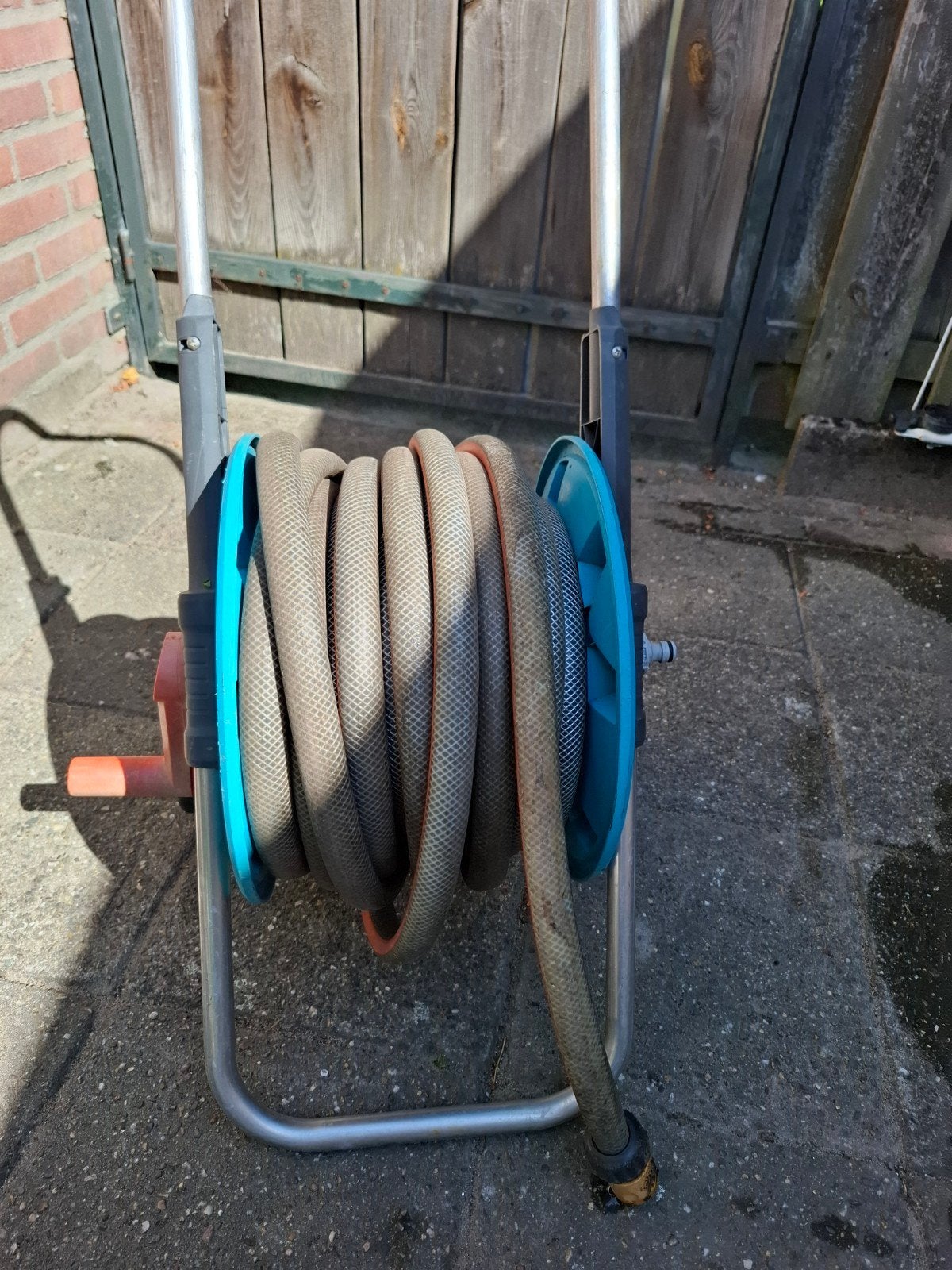 Gardena haspel met ongeveer 20 meter tuinslang, Tuin en Terras, Tuinslangen, Ophalen, Gebruikt, Tuinslang