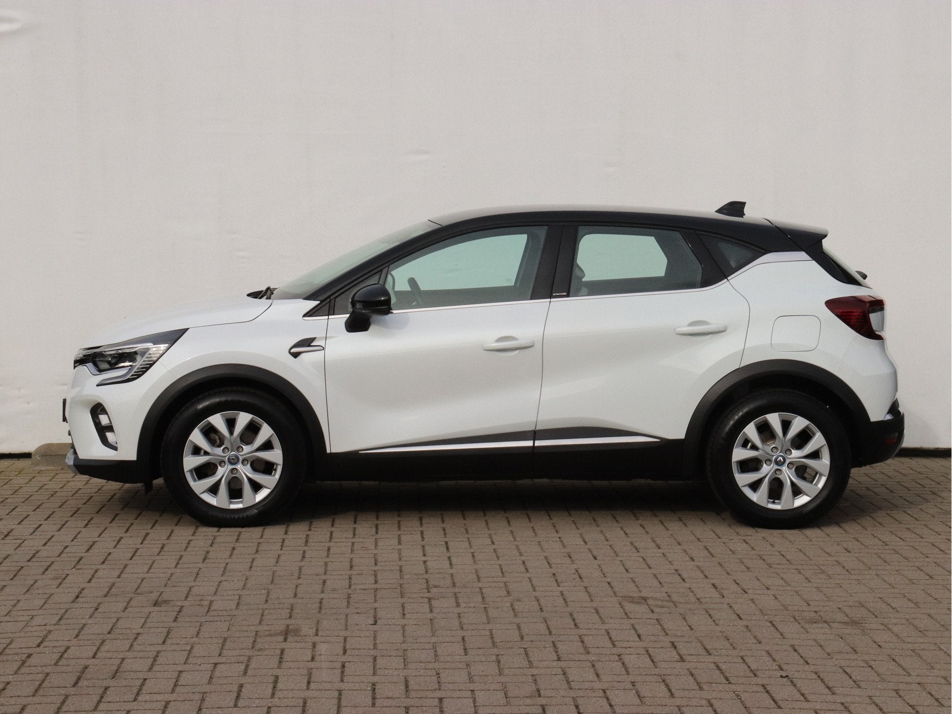 Renault Captur 1.6 E-Tech Plug-in Hybrid 160 Intens GROOT NA, 77 km/l, Gebruikt, 4 cilinders, Leder en Stof