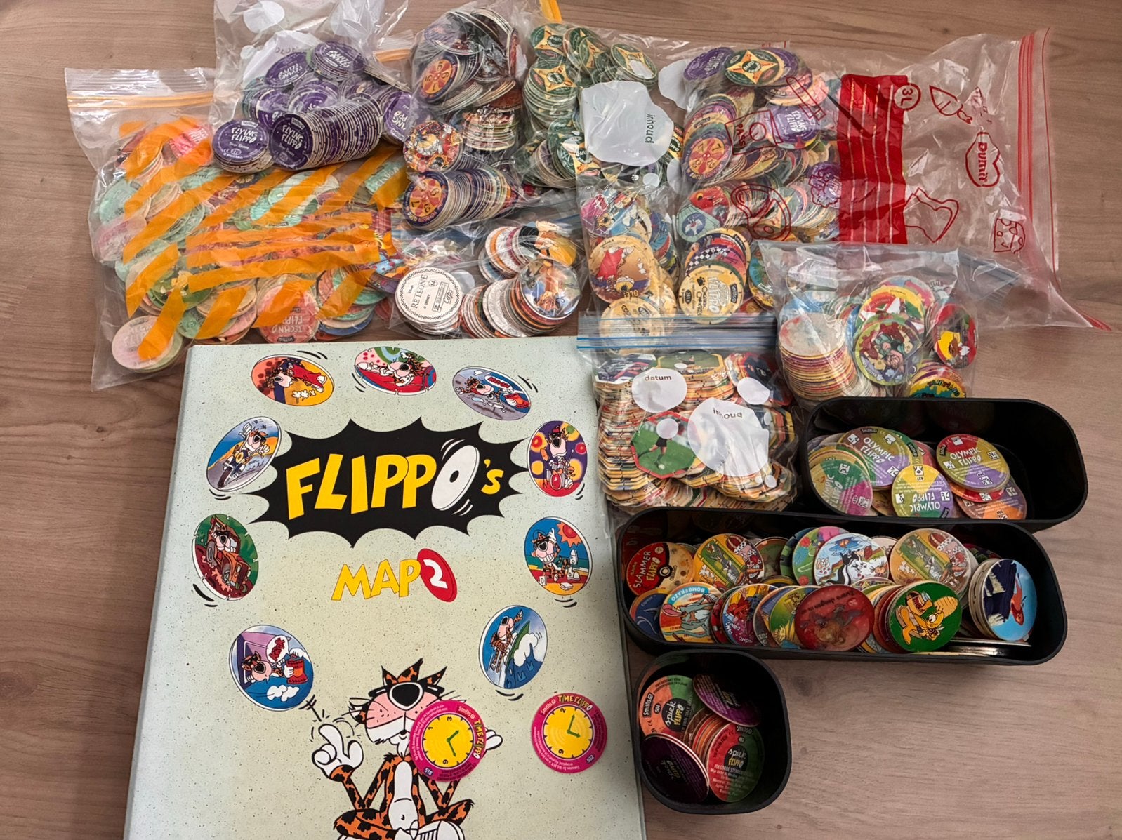 Een heleboel flippo’s + lege map 2, Ophalen of Verzenden, Techno, Losse flippo's