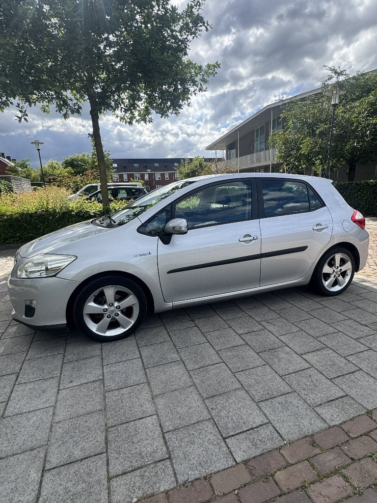 Toyota Auris 1.8 Full Hybrid 5DR CVT 2011 Grijs, Auto's, Toyota, Euro 5, Stof, Zwart, 4 cilinders