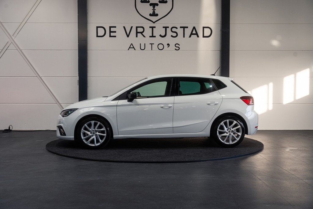 Seat Ibiza 1.0 TSI FR Business Intense, Auto's, Gebruikt, 580 kg, Met garantie (alle), 1072 kg