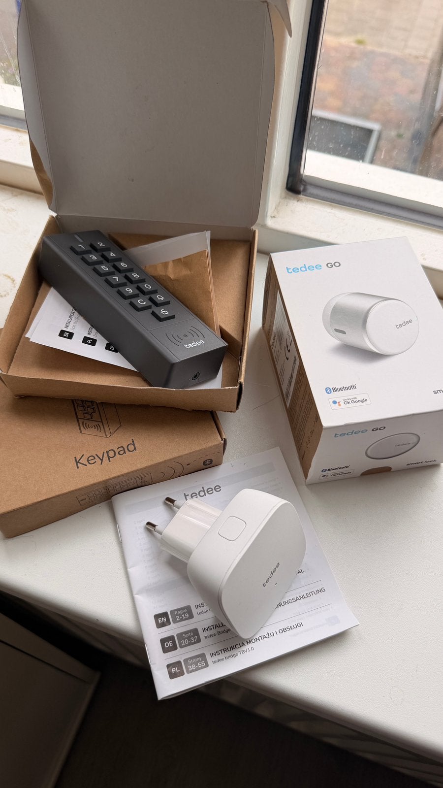 Tedee Go + Bridge + 2x Keypad | Nieuw | Complete set, Ophalen of Verzenden, Nieuw, Overige materialen, Slot